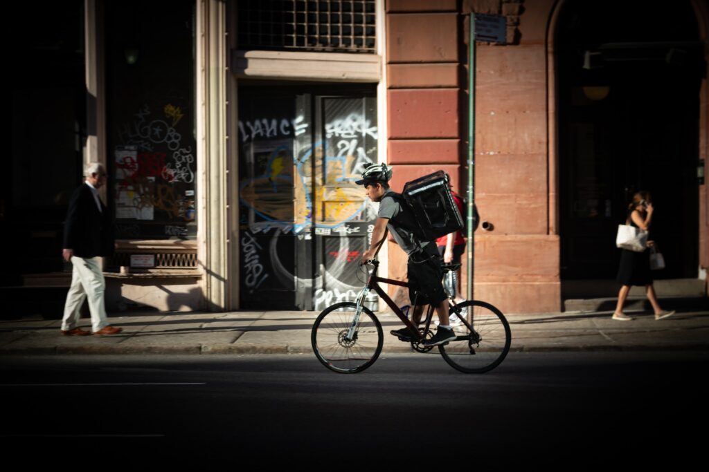 Man riding bike through the city